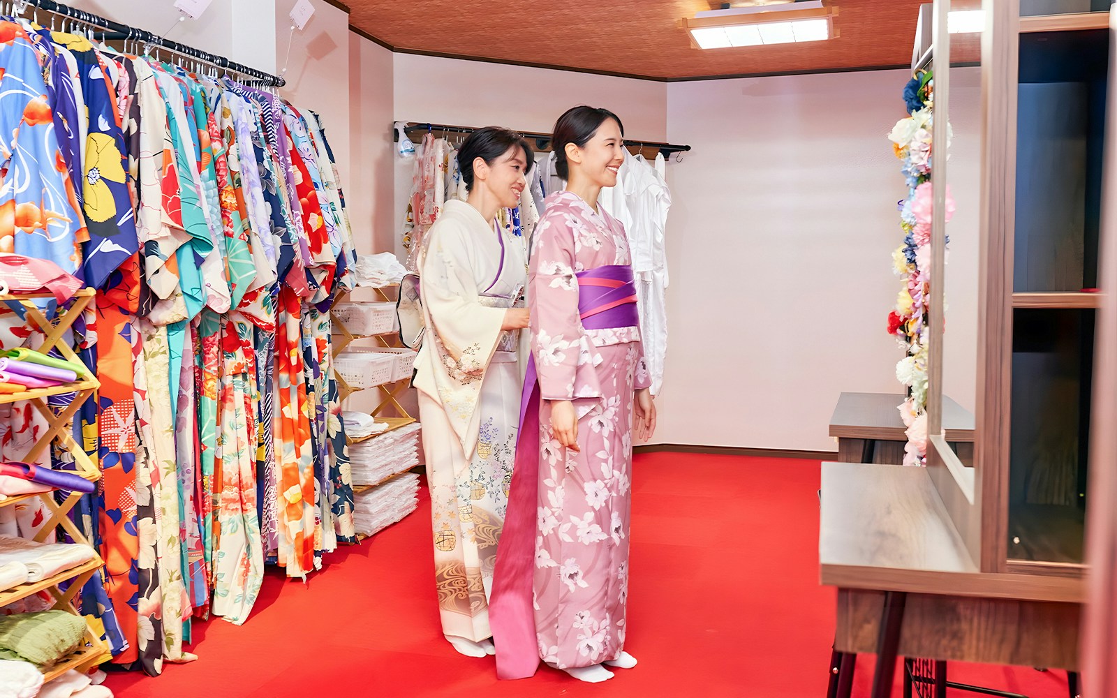 Tourists dressing in kimonos for a Tokyo Maikoya Traditional Tea Ceremony in Japan.