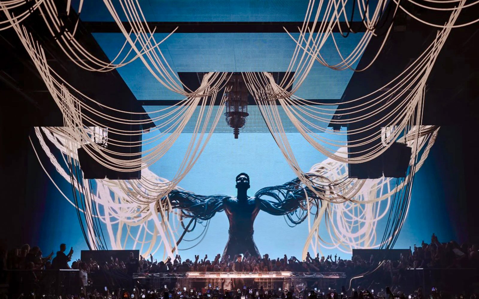 Anyma presents AEDEN UNVRS performance with digital art and crowd in Ibiza.