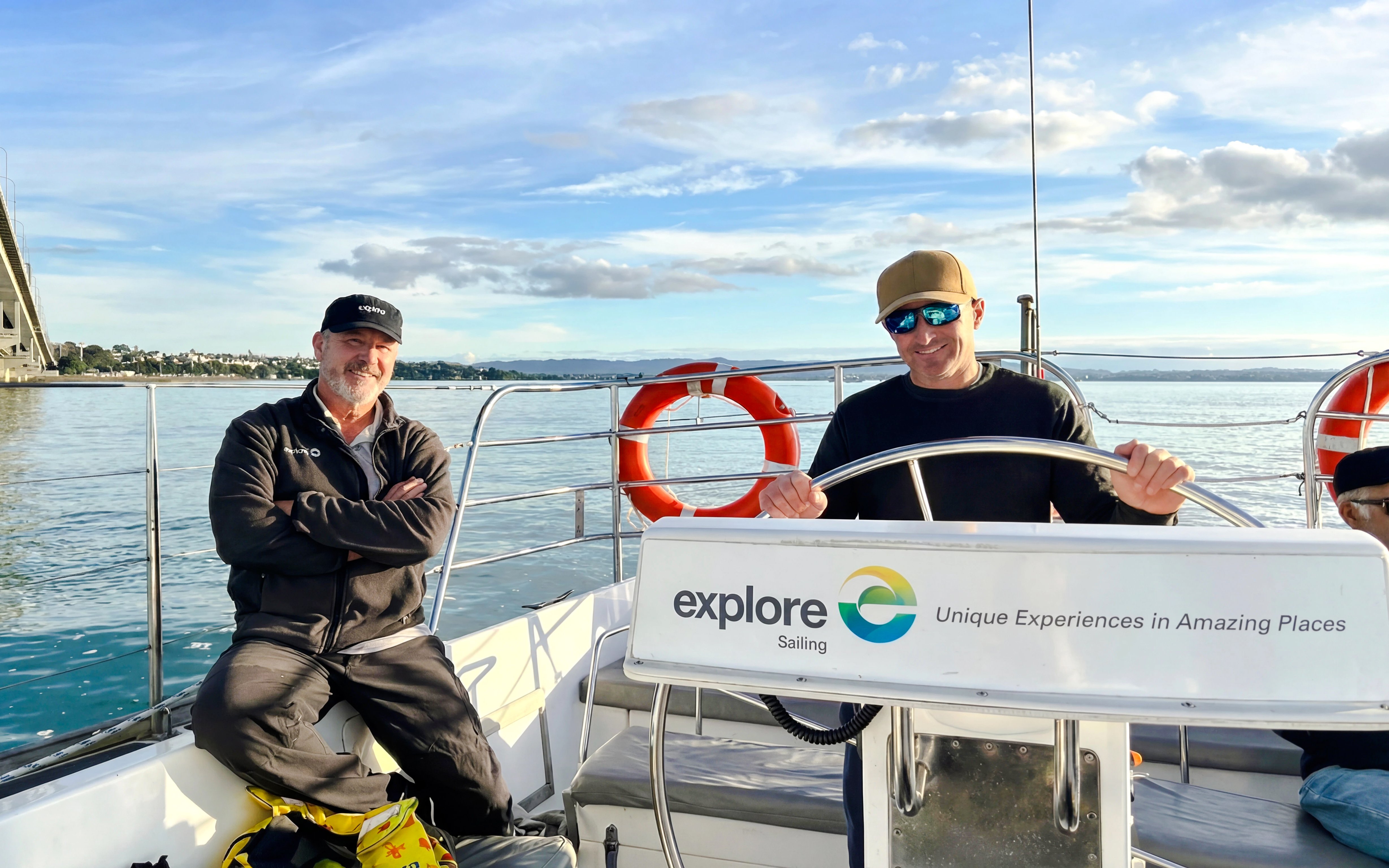 Sailors on a boat during Auckland Waitematā Harbour sailing cruise.