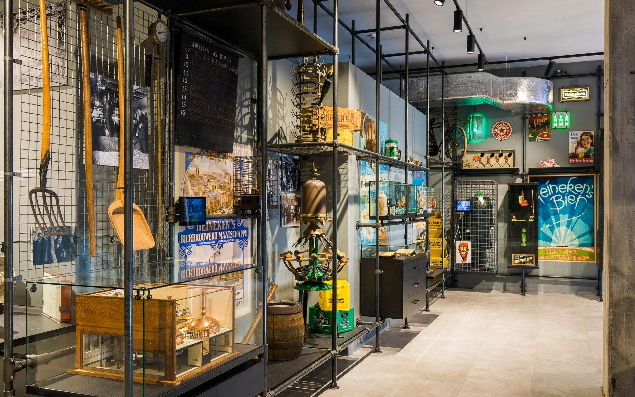 Heineken Experience museum exhibit showcasing brewing artifacts in Heritage Quarter, Amsterdam.