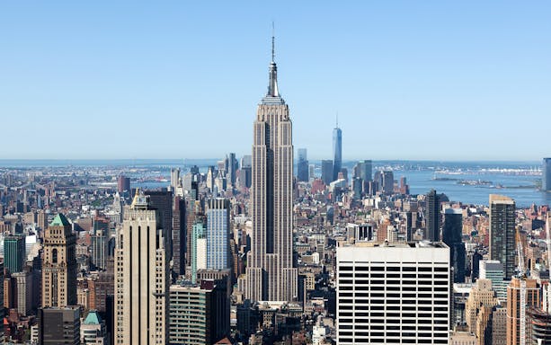 Aerial view of the Empire State Building in New York City skyline.