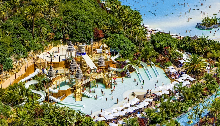 Aerial view of Siam Park's wave pool and water slides in Tenerife, Spain.