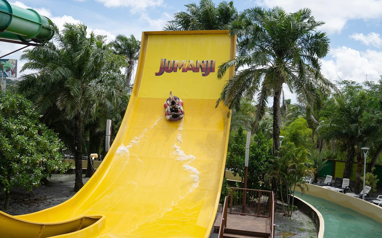 Visitors on a water slide at Jumanji attraction, Columbia Pictures Aquaverse Pattaya.