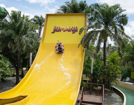 Visitors on a water slide at Jumanji attraction, Columbia Pictures Aquaverse Pattaya.