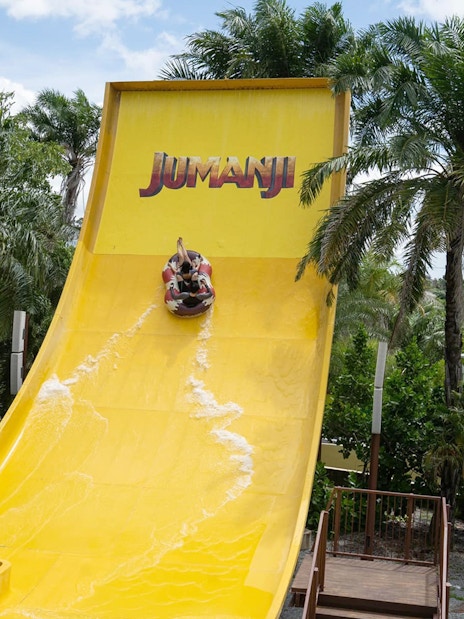 Visitors on a water slide at Jumanji attraction, Columbia Pictures Aquaverse Pattaya.