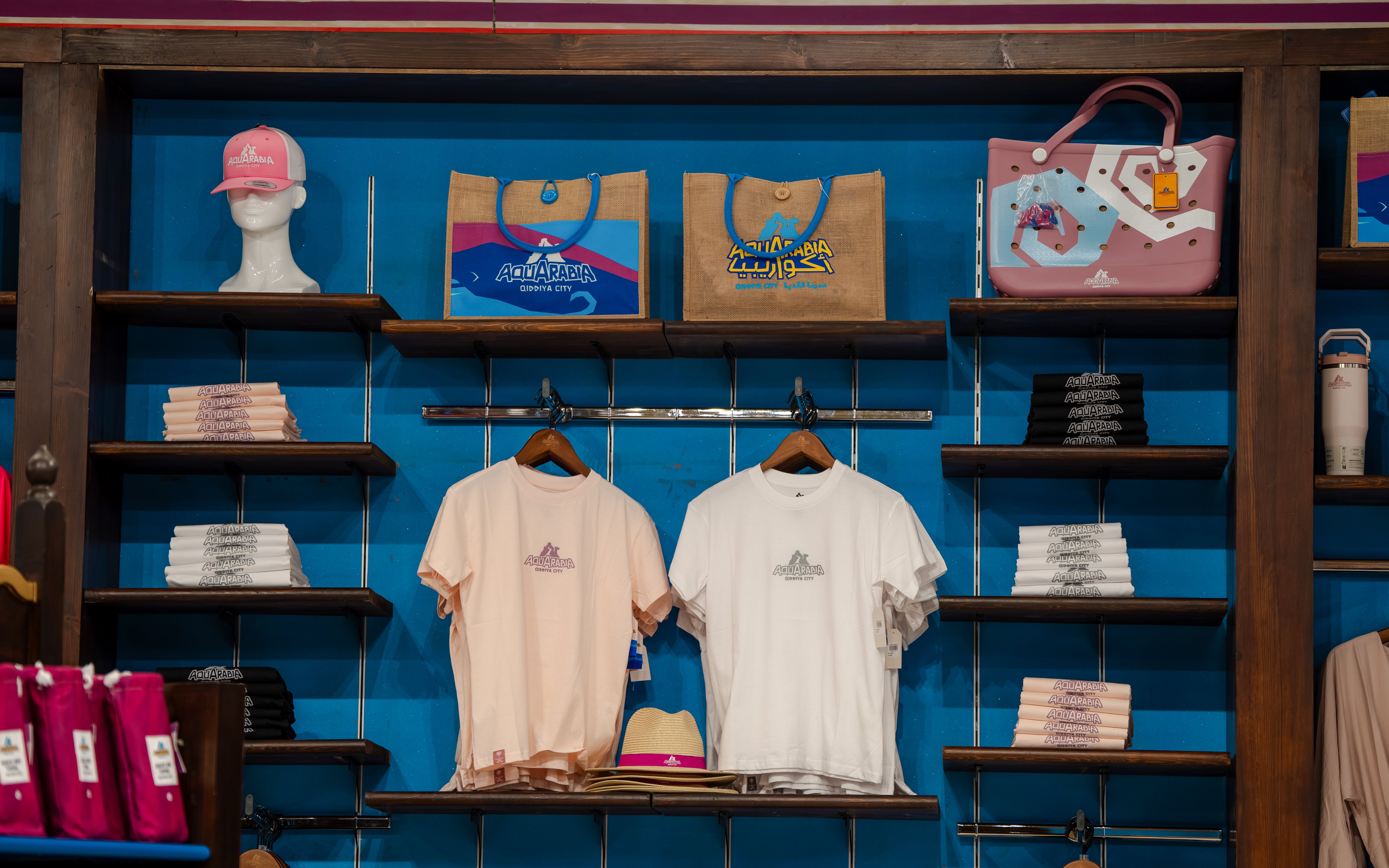 Merchandise display at Aquarabia Water Theme Park store in Qiddiya City, Saudi Arabia.