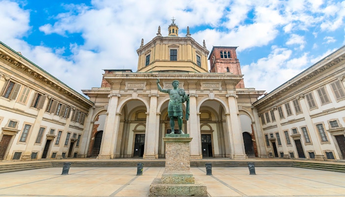 Basilica di San Lorenzo Maggiore facade with Roman columns in Milan, Italy.