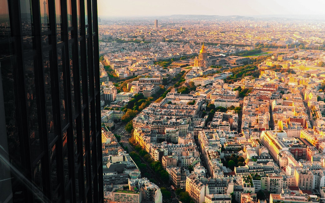 View from Montparnasse Tower Roof Terrace overlooking Paris cityscape.