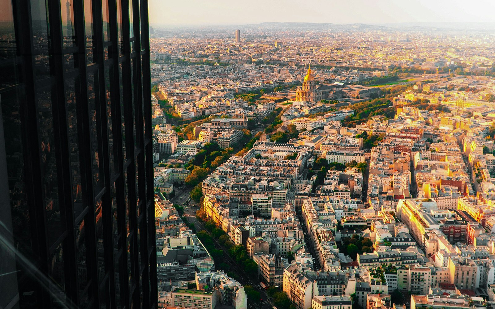 View from Montparnasse Tower Roof Terrace overlooking Paris cityscape.