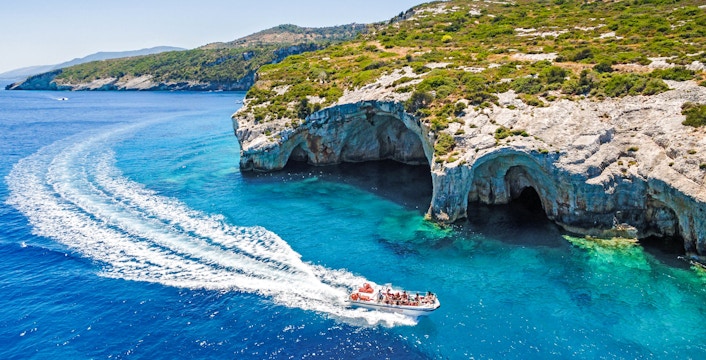 Aerial view of boat near Agios Nikolaos blue caves, Zakynthos.