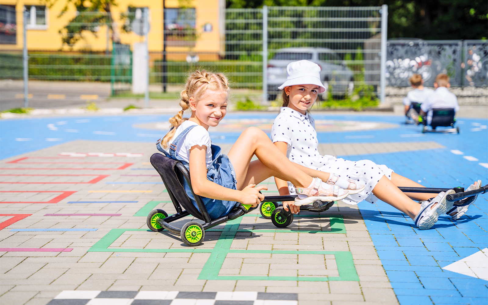 Visitors enjoying the Zoom Bug ride at ESCAPE Penang, Malaysia, surrounded by lush greenery.