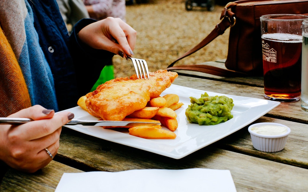 Fish and chips with mushy peas at a pub near Victoria.