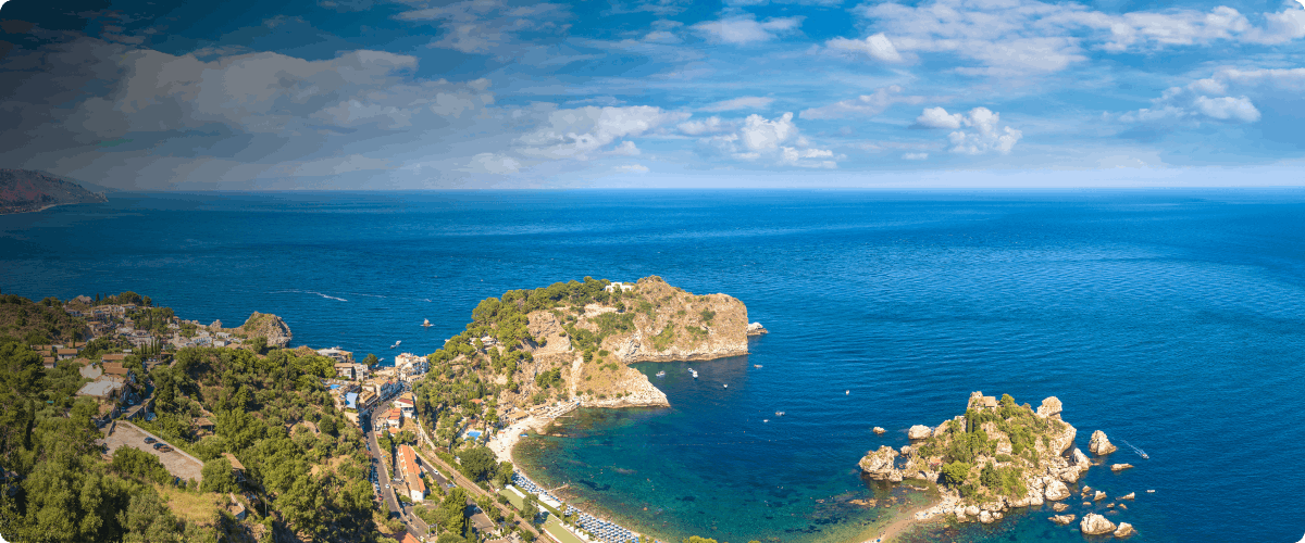 Aerial view of Isola Bella and coastline in Taormina, Sicily.