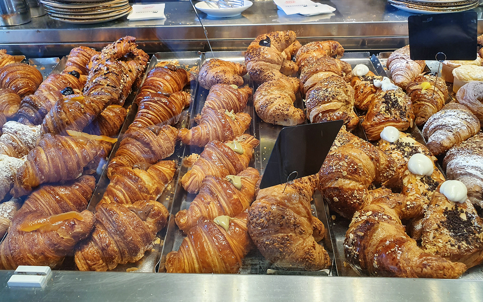 Florence food tour with croissant at Antico Vinaio bakery.
