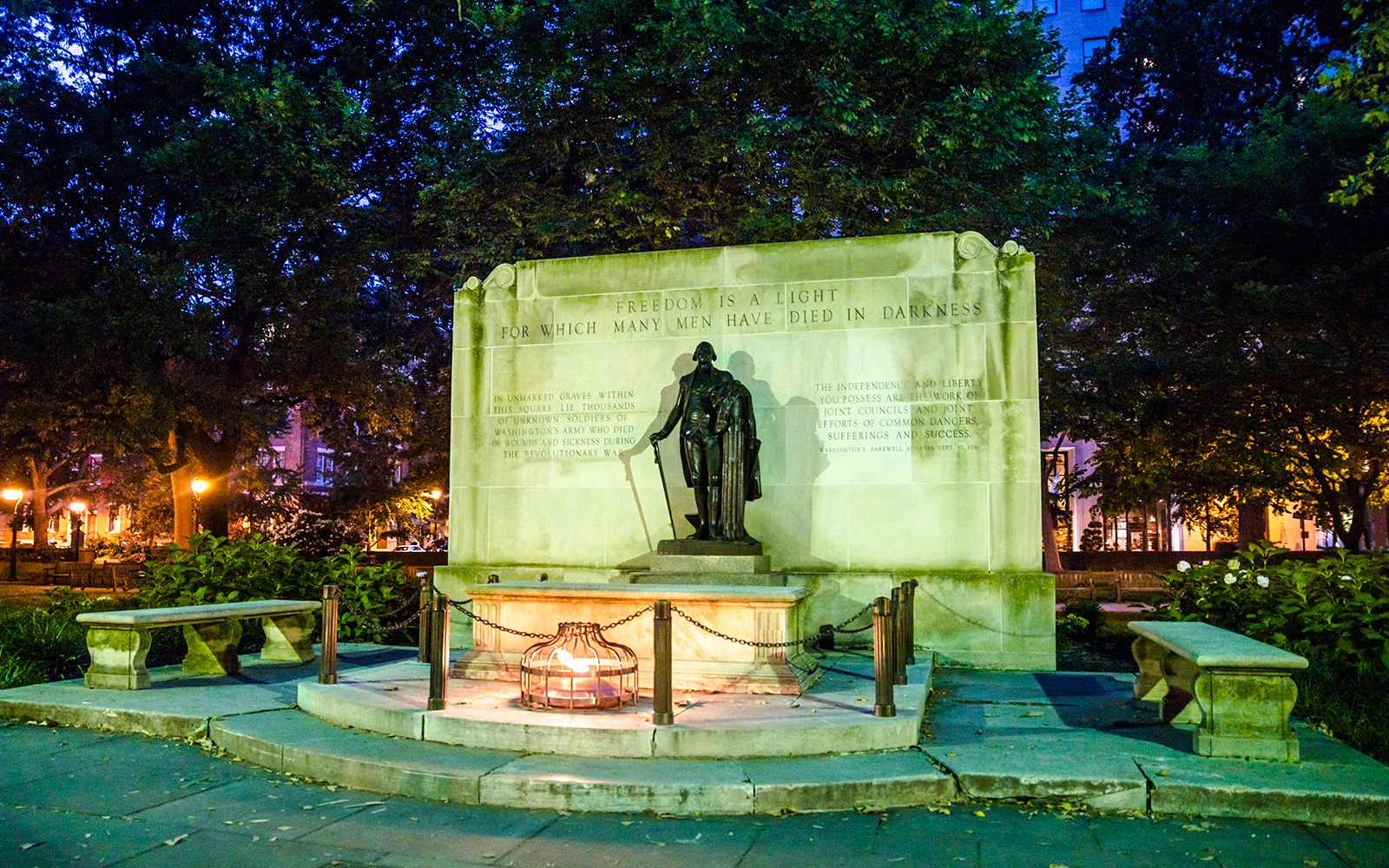 Washington Square Park memorial statue in Philadelphia, Pennsylvania at night.