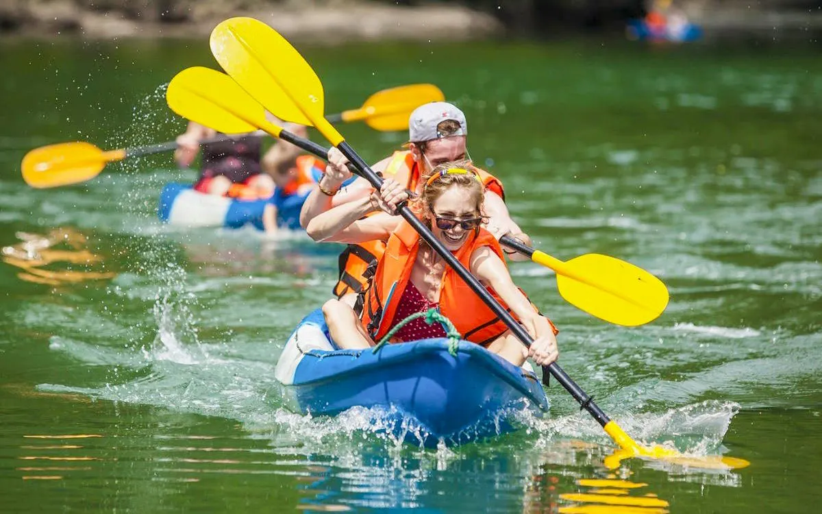 Kayaking in Ha Long Bay during a 5-star premium cruise.