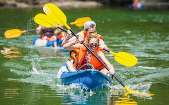 Kayaking in Ha Long Bay during a 5-star premium cruise.