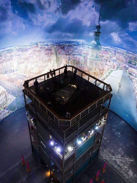 Panoramic view inside Panometer Dresden with cityscape mural.