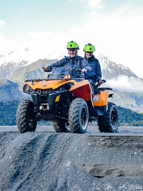 Quad biking adventure with mountain views at Franz Josef, New Zealand.