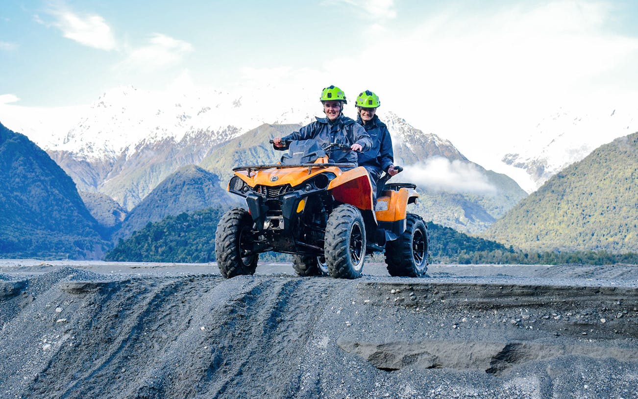 Quad biking adventure with mountain views at Franz Josef, New Zealand.