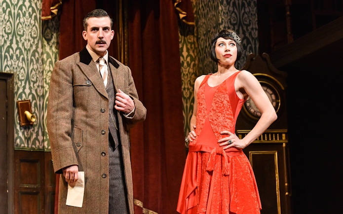 Actors in period costumes on stage during "The Play That Goes Wrong.