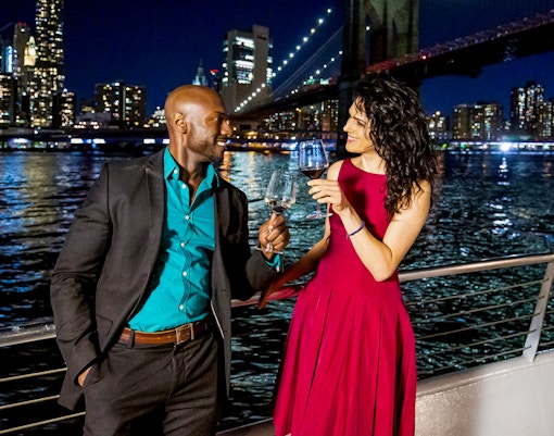 Couple having drinks on Premier Dinner Cruise