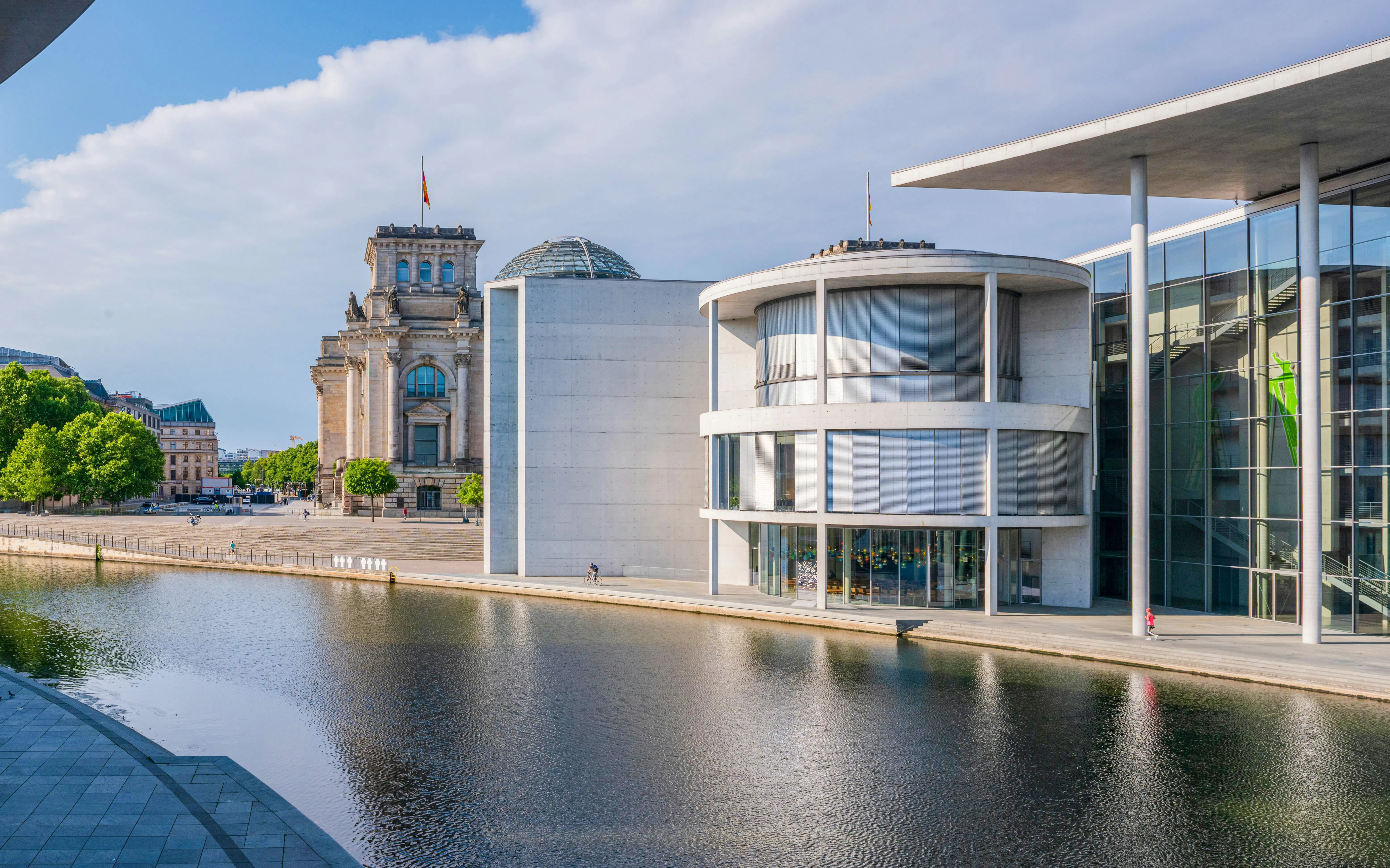 Reichstag and Spree River view from pedestrian bridge in Berlin.