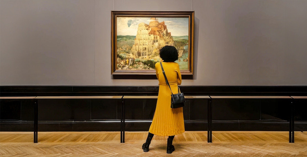Visitor viewing "The Tower of Babel" by Pieter Bruegel at KHM, Vienna.