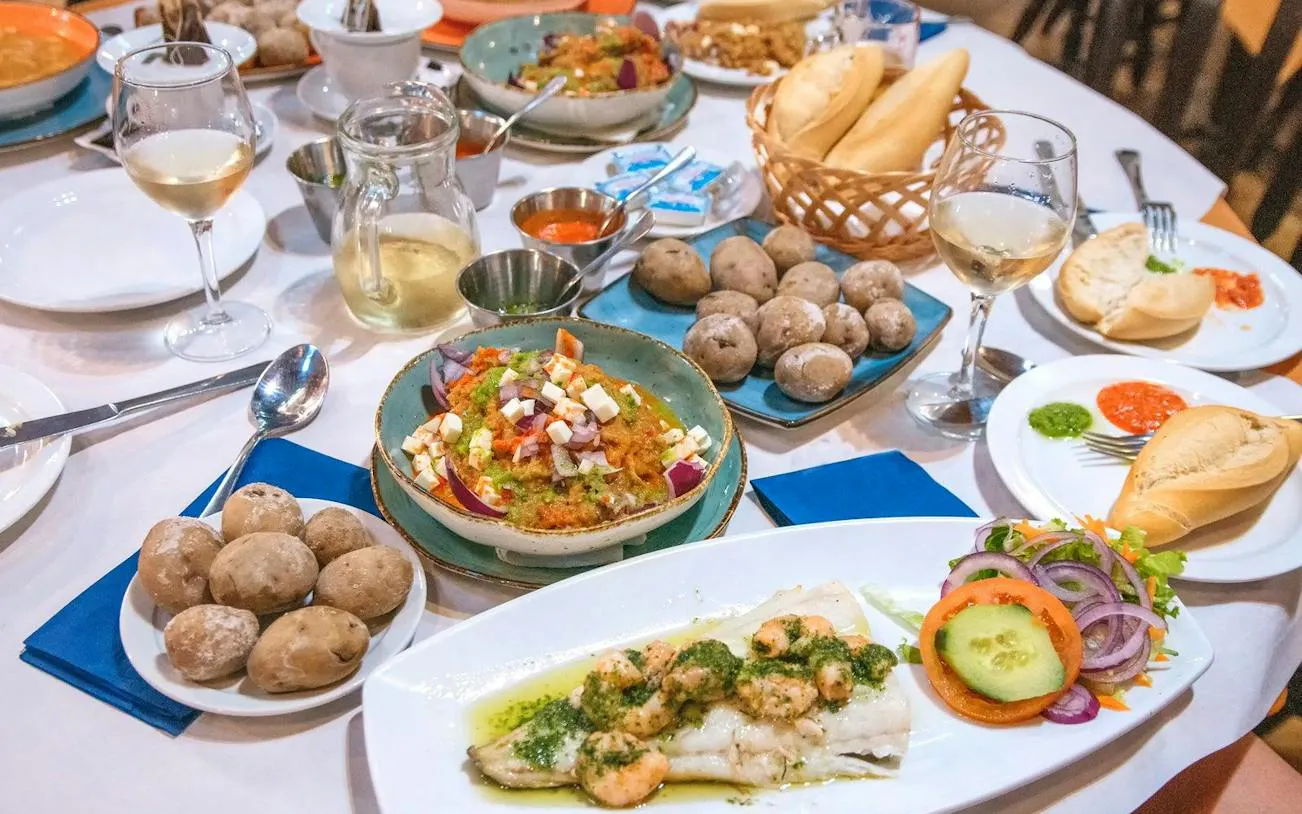 Canarian tapas and wine tasting spread with papas arrugadas and seafood in Tenerife.