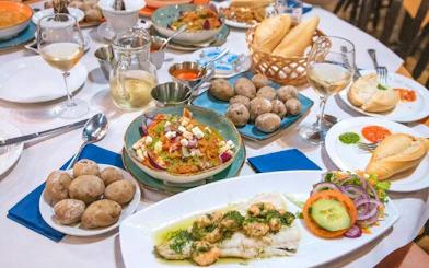 Canarian tapas and wine tasting spread with papas arrugadas and seafood in Tenerife.
