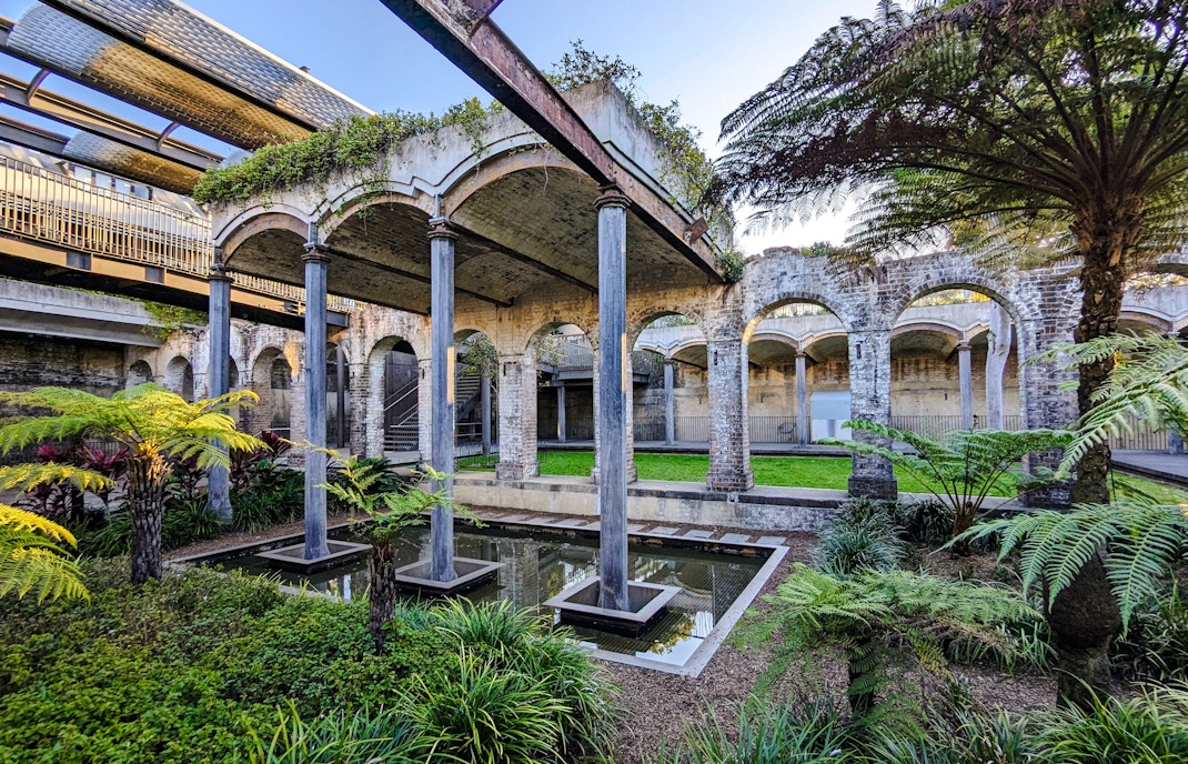 Paddington Reservoir Gardens in Australia with arches, greenery, and water features.