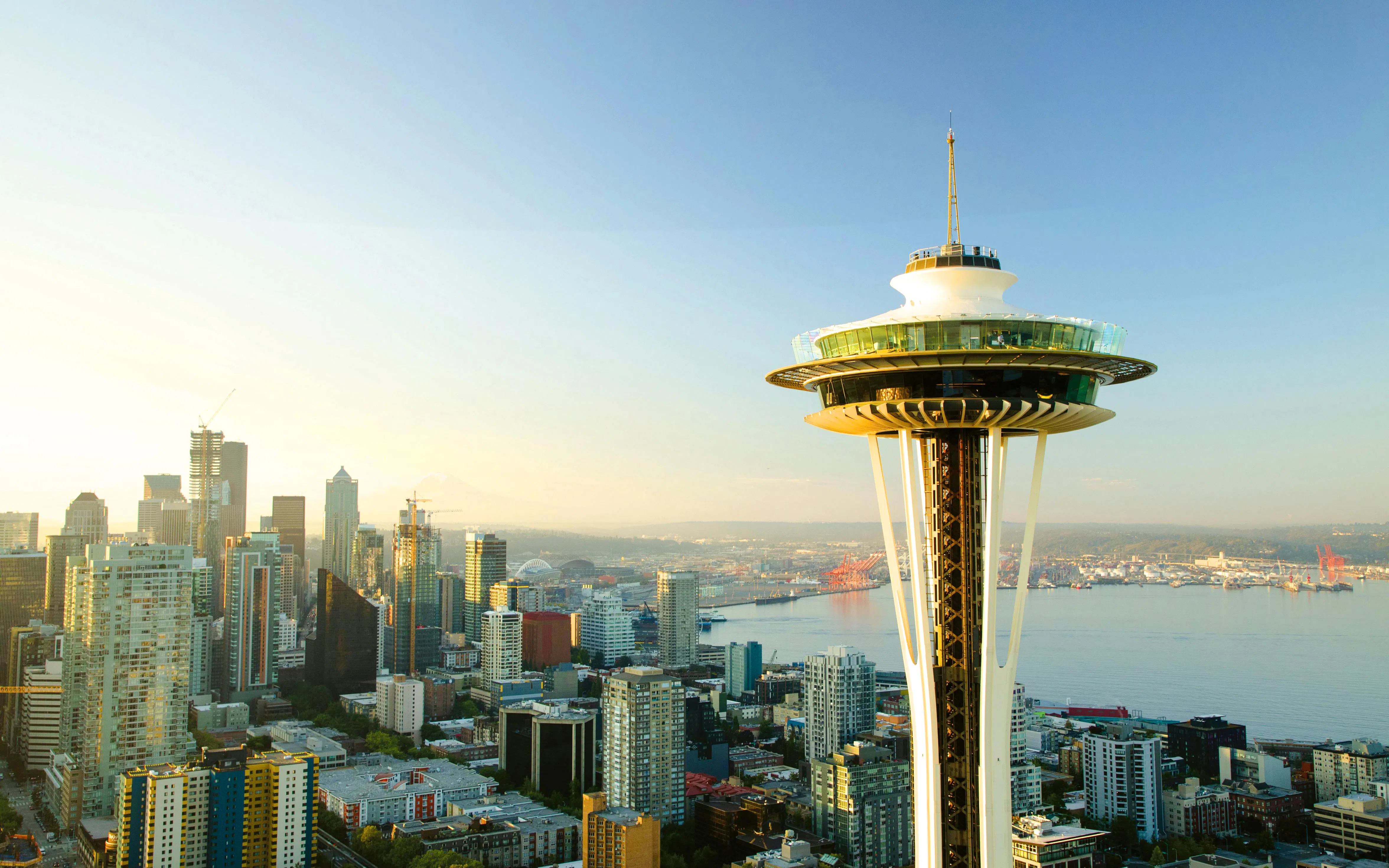 Space Needle overlooking Seattle skyline and waterfront.
