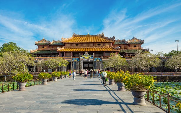 Imperial Royal Palace entrance with visitors, Hue, Vietnam, UNESCO World Heritage Site.