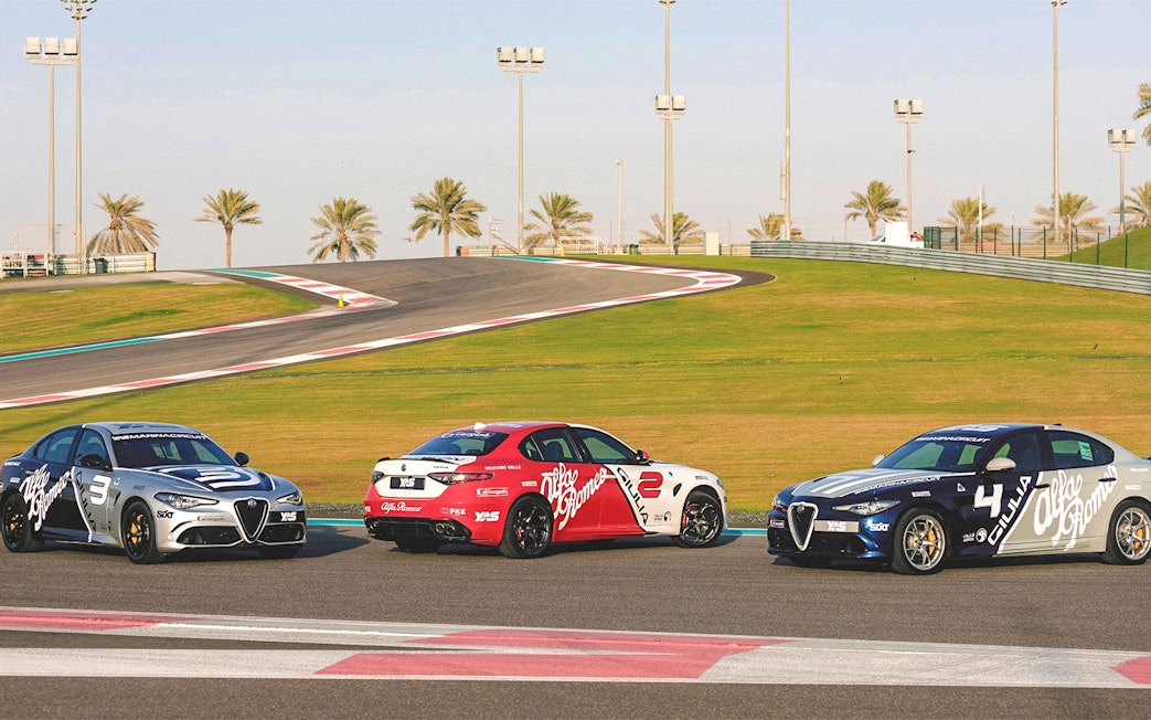 Alfa Romeo Giulia Quadrifoglio cars on Yas Marina Circuit track.
