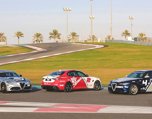 Alfa Romeo Giulia Quadrifoglio cars on Yas Marina Circuit track.