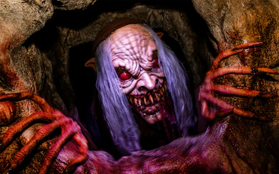 Creepy creature with long claws at Hollywood Horror Nights, Universal Studios Hollywood, Los Angeles.