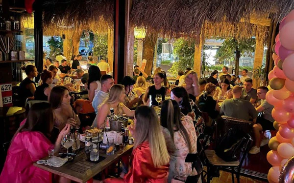 Tirana Pub Crawl: Guided Nightlife Tour with Entry to Three Venues, Welcome Drinks, and DJ Entertainment