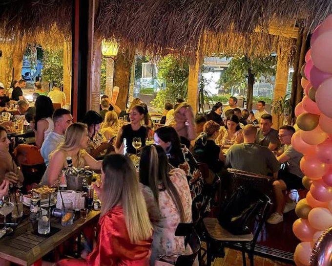 Tirana Pub Crawl: Guided Nightlife Tour with Entry to Three Venues, Welcome Drinks, and DJ Entertainment