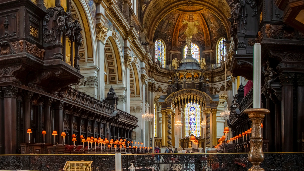 St Paul's Cathedral interior with ornate arches and stained glass windows.