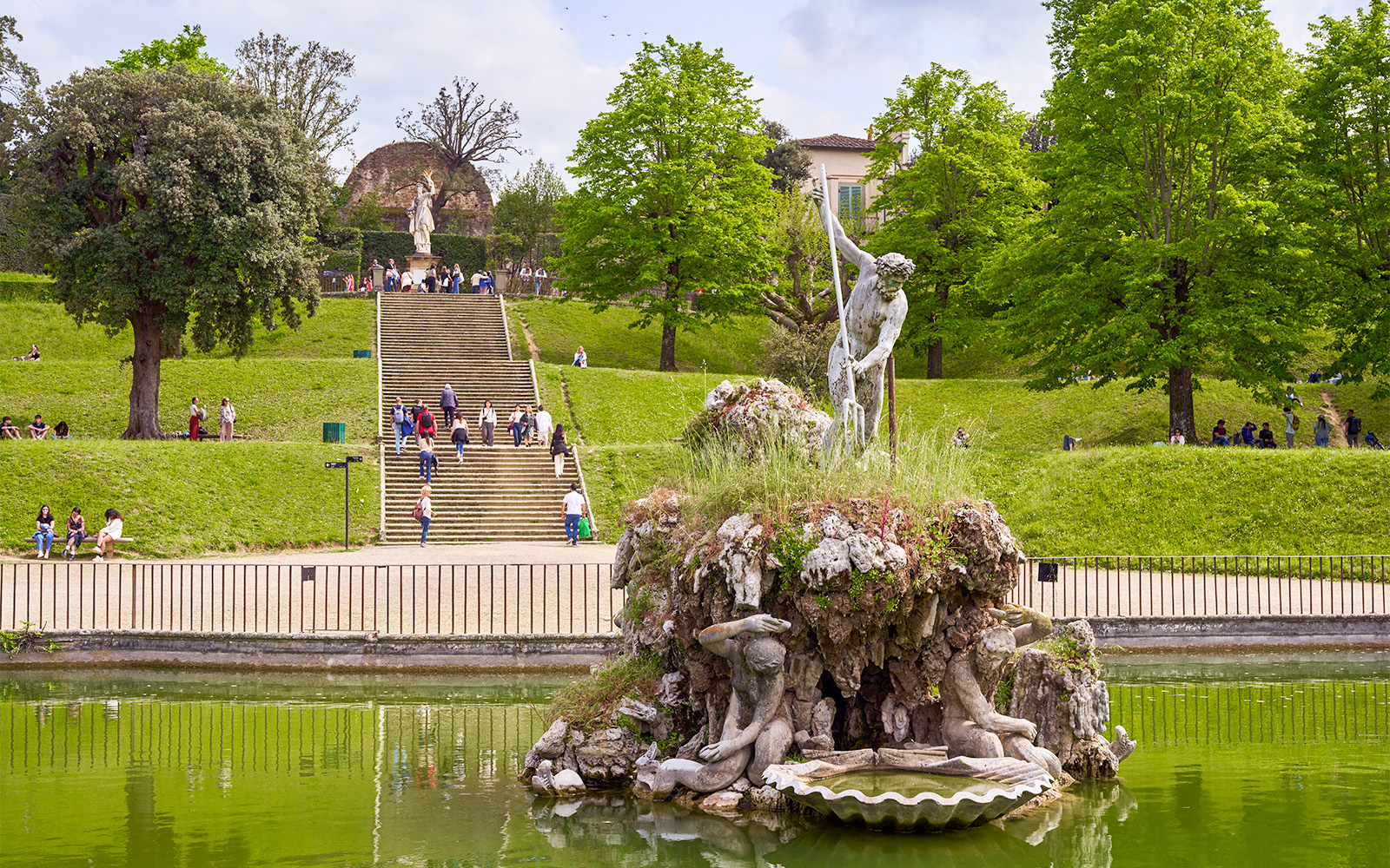 Neptune Fountain in Boboli Gardens, Florence, Italy, with intricate sculptures and water features.