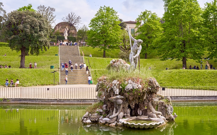 Neptune Fountain in Boboli Gardens, Florence, Italy, with intricate sculptures and water features.