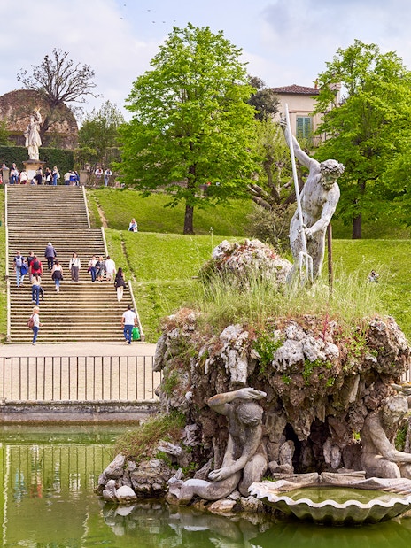 Neptune Fountain in Boboli Gardens, Florence, Italy, with intricate sculptures and water features.