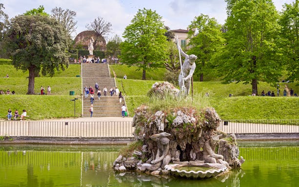 Neptune Fountain in Boboli Gardens, Florence, Italy, with intricate sculptures and water features.