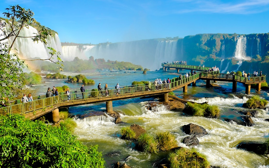 Visitors on observation platform at Iguazu Falls, Foz do Iguaçu, Brazil.