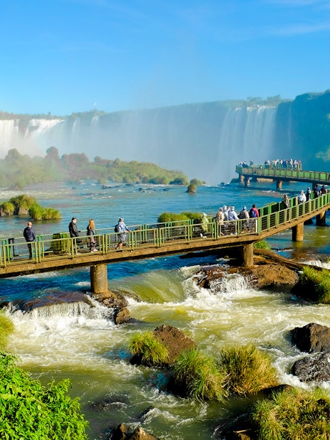 Visitors on observation platform at Iguazu Falls, Foz do Iguaçu, Brazil.