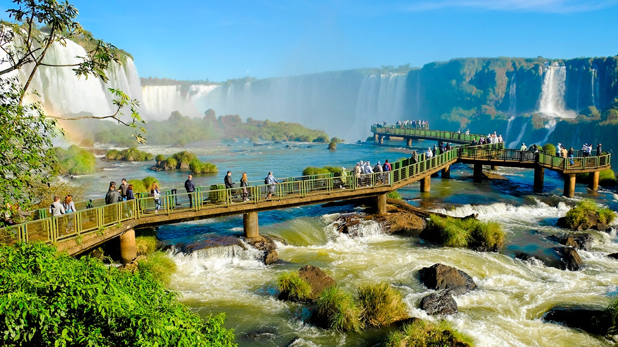Visitors on observation platform at Iguazu Falls, Foz do Iguaçu, Brazil.