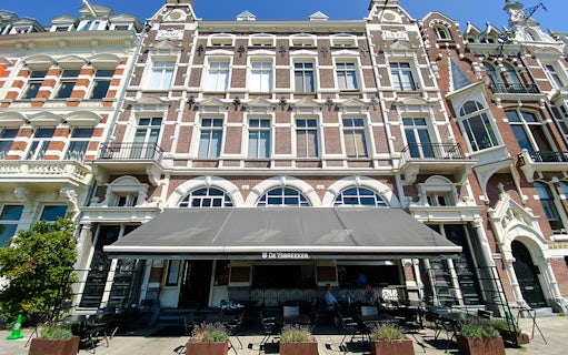 Historic building facade in Amsterdam, part of the Anne Frank Tour.