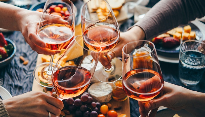 People toasting with wine