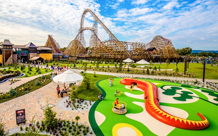 Roller coaster and play area at Energylandia Amusement Park, Poland.