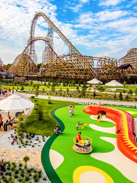 Roller coaster and play area at Energylandia Amusement Park, Poland.